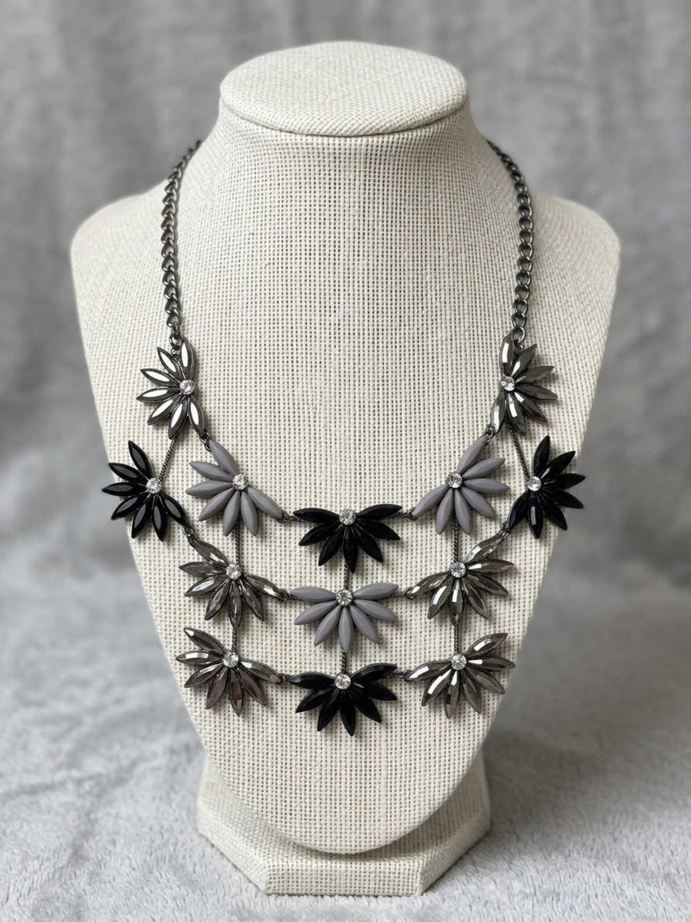 gunmetal floral starburst bib